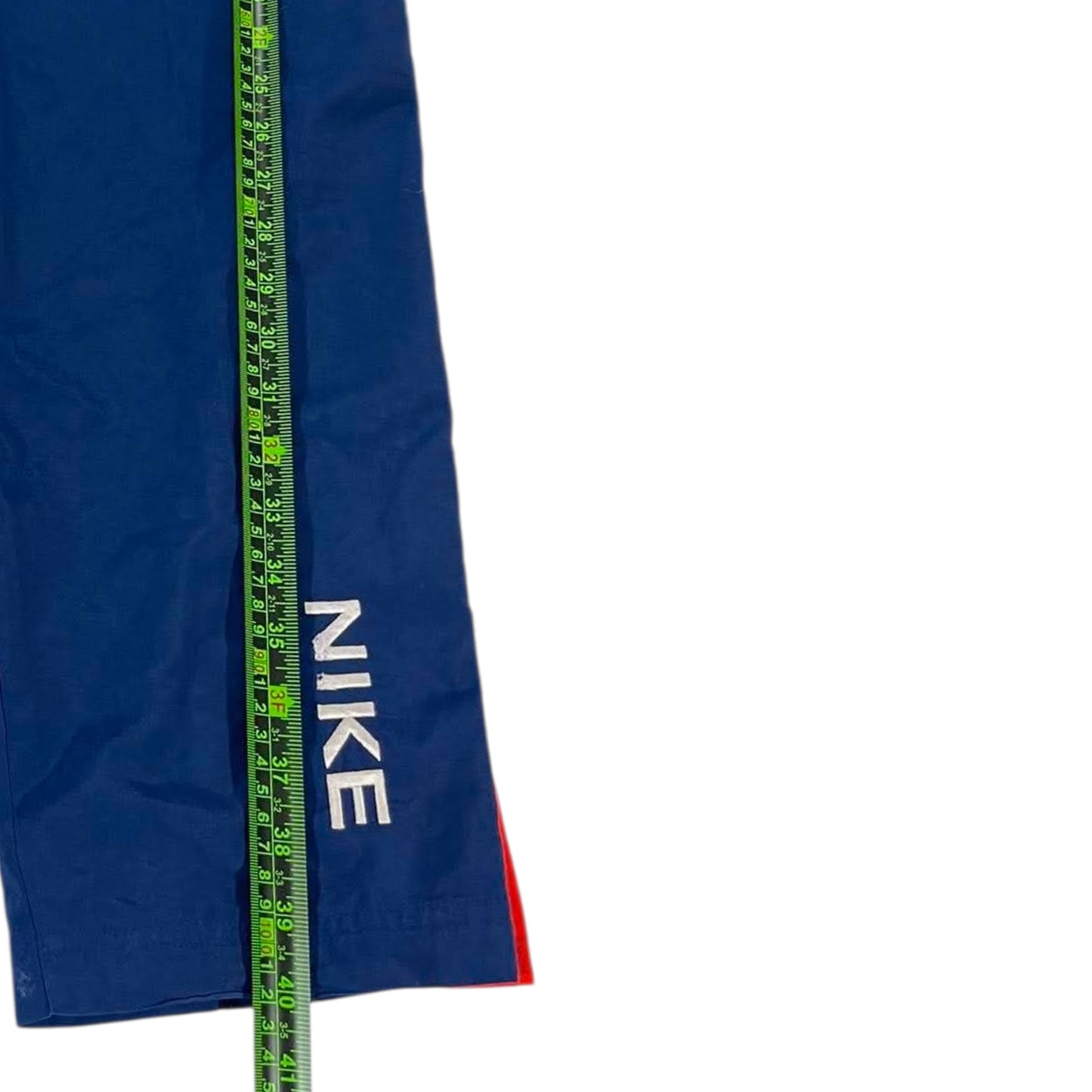 VINTAGE NIKE NAVY BLUE AND ORANGE SNAP ON TRACK PANTS (L)