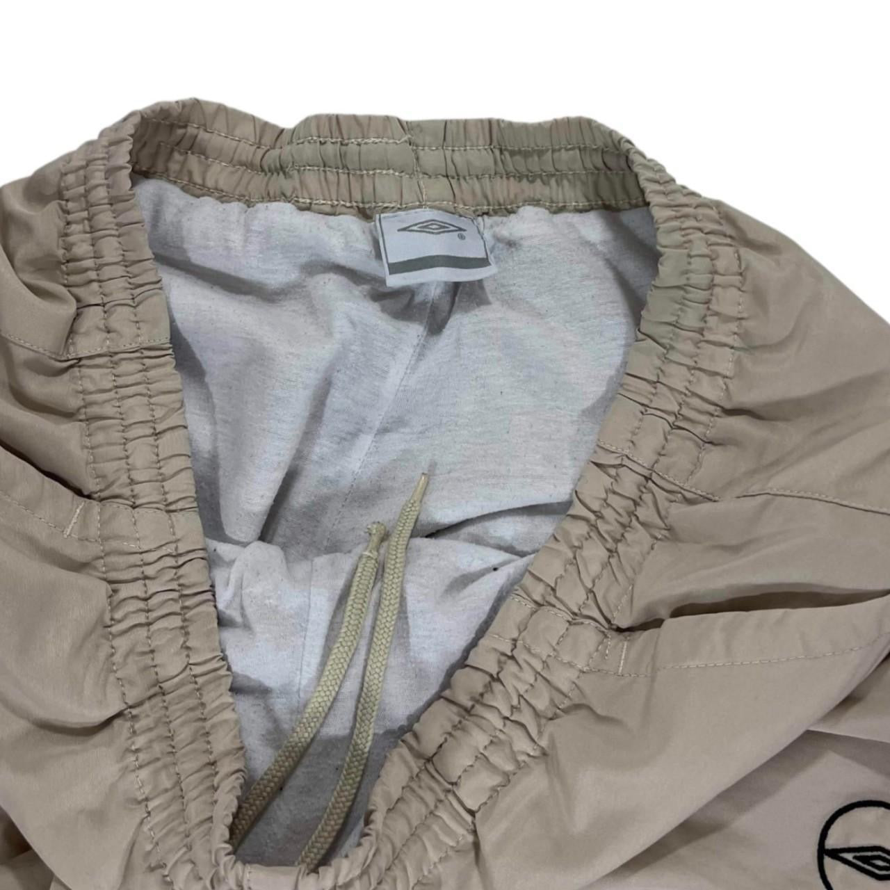 VINTAGE UMBRO TAN & CREAM TRACK PANTS (L)