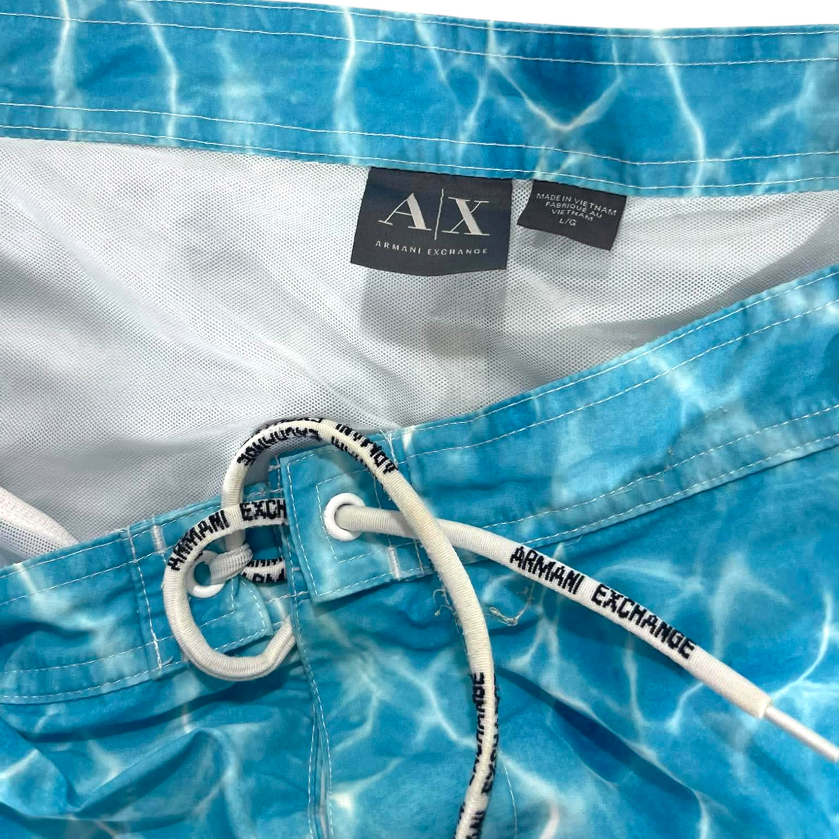 ARMANI EXCHANGE BLUE BOARD SHORT (L (36'))