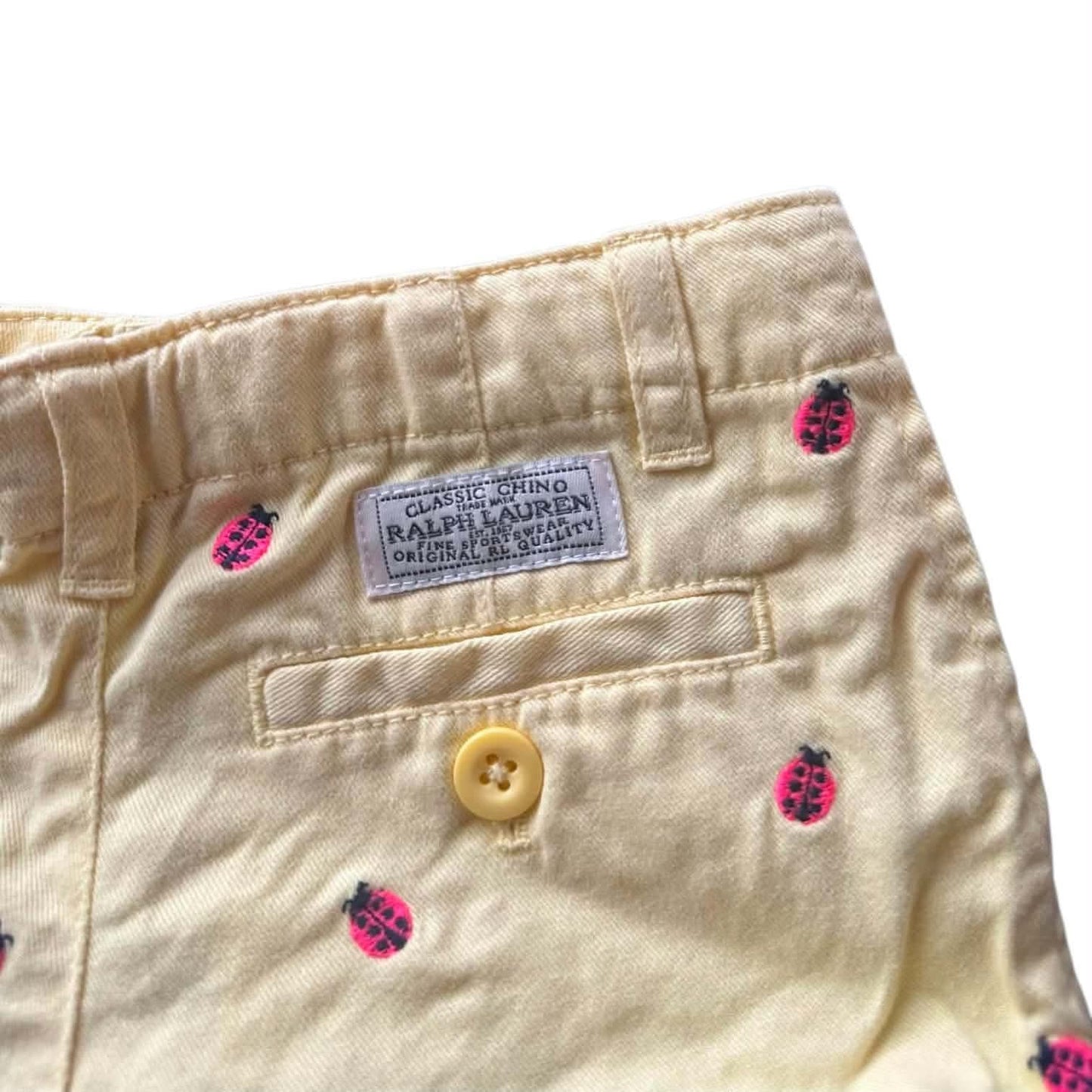 RALPH LAUREN YELLOW SHORTS WITH PINK LADYBUG EMBROIDERY (2T)