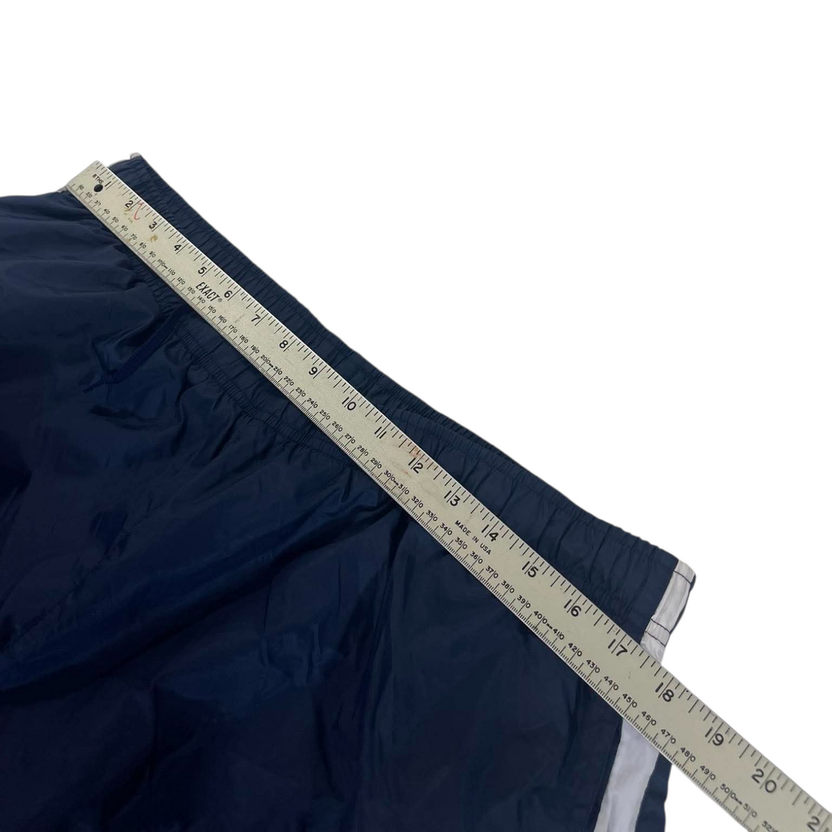 VINTAGE NIKE NAVY BAGGY TRACK PANTS⁶ (BEST FIT LARGE - XL)