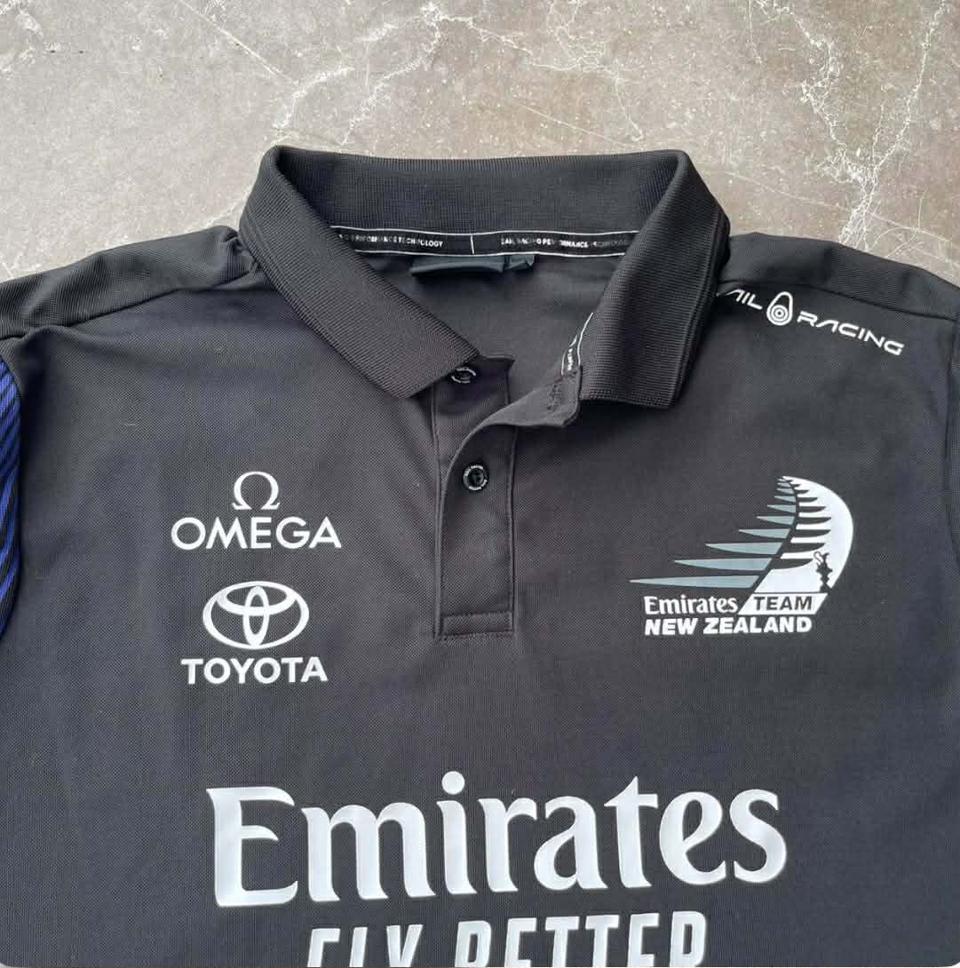 EMIRATES TEAM NEW ZEALAND BLACK POLO SHIRT (M-L)