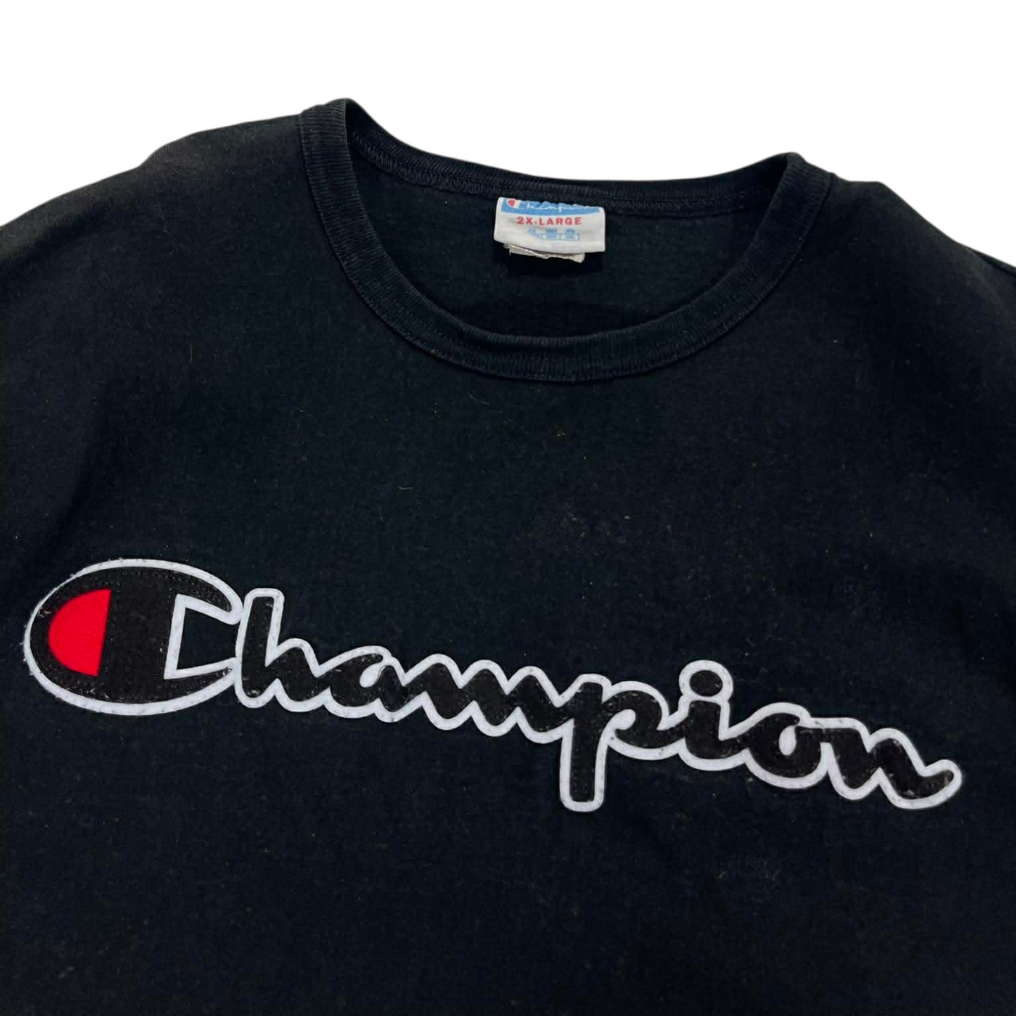 CHAMPION EMBROIDED BLACK SPELLOUT TEE (L-XL)