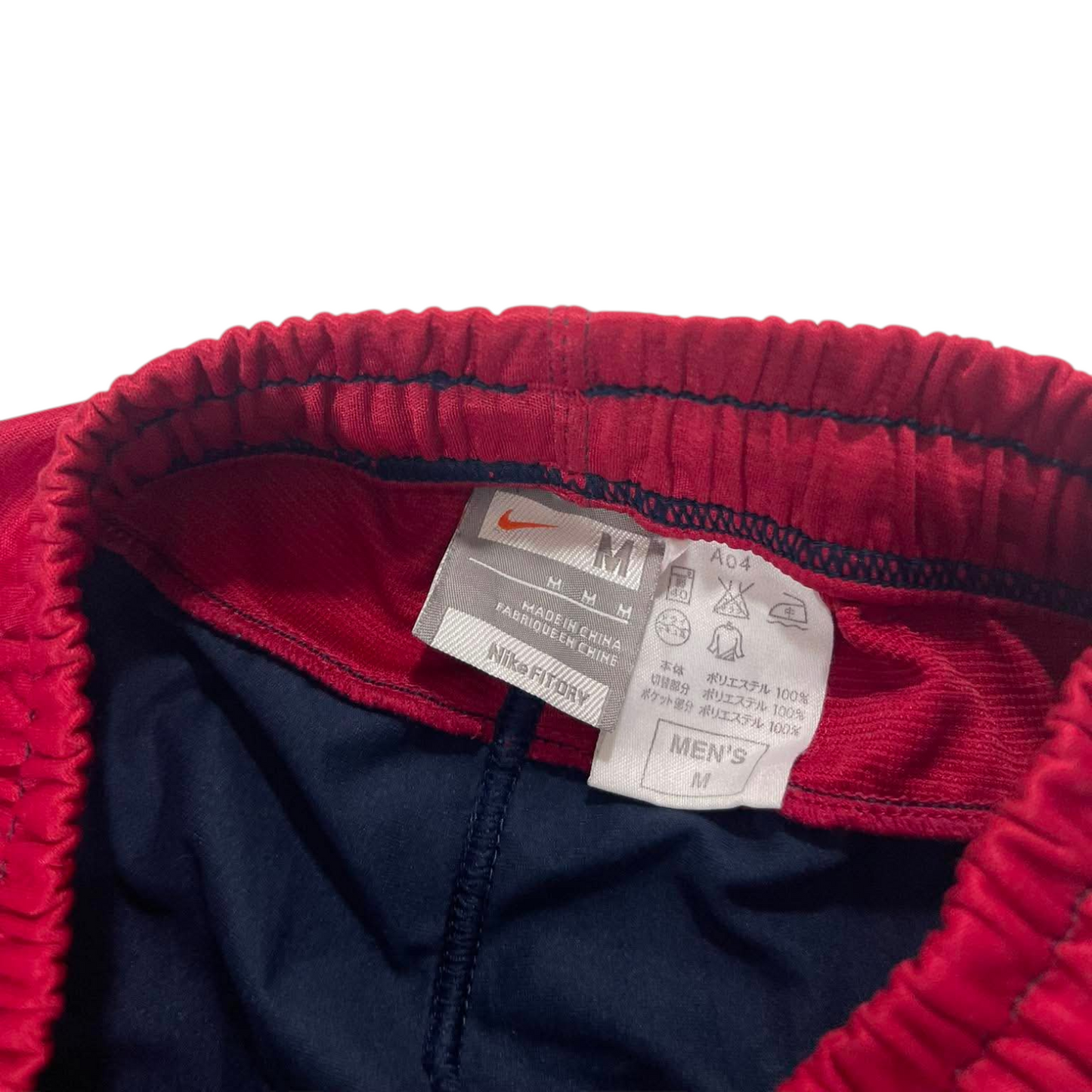 NIKE BLUE/RED TRACK PANTS¹⁰ (S - M)
