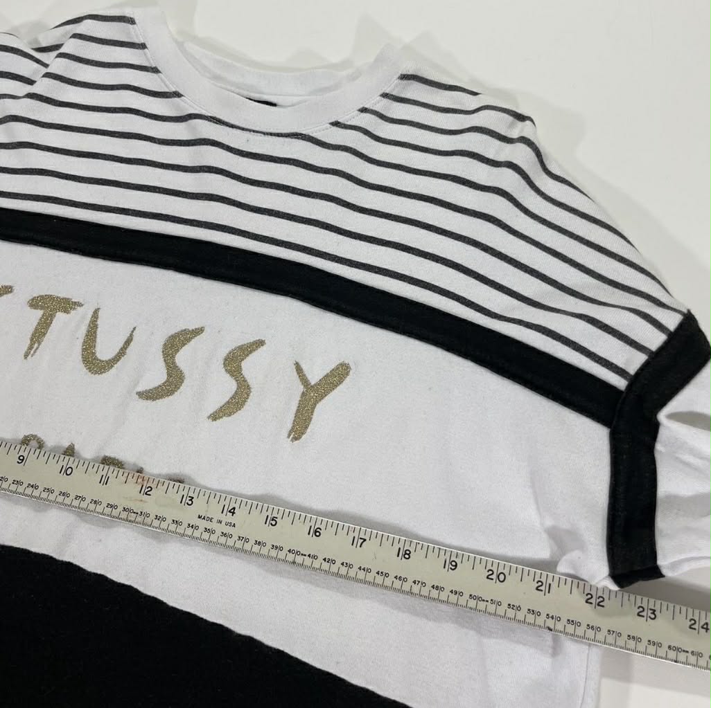 VINTAGE STUSSY BLACK + WHITE STRIPED LONG SLEEVED WITH GOLD GLITTER LOGO