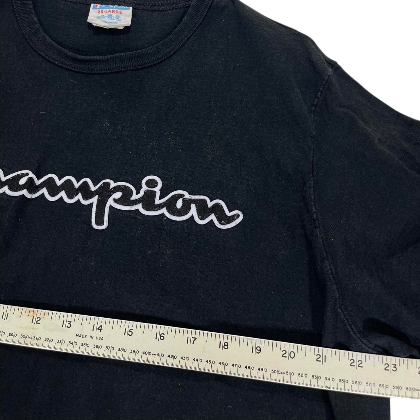 CHAMPION EMBROIDED BLACK SPELLOUT TEE (L-XL)