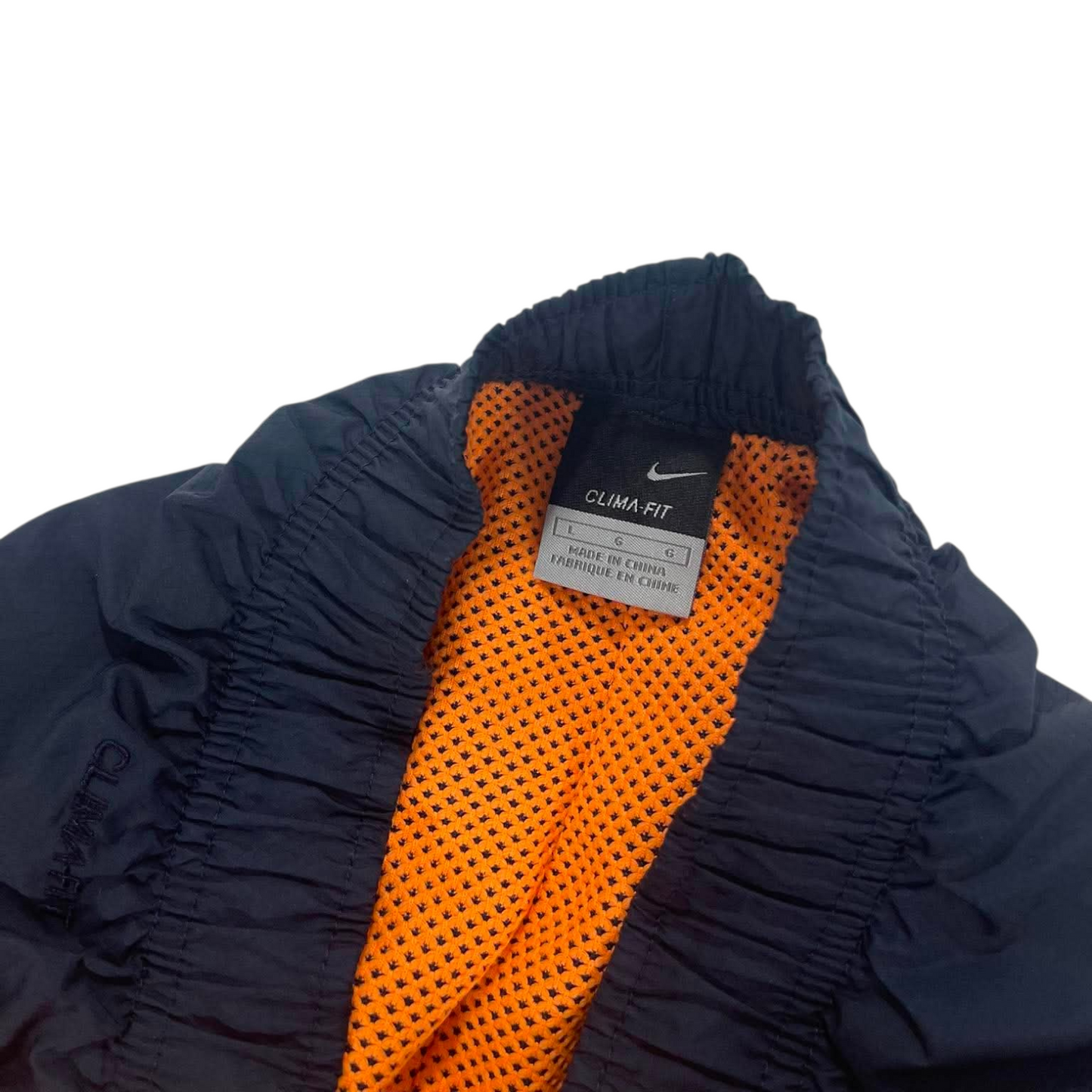 NIKE NAVY BLUE TRACK PANTS WITH ORANGE HIT (L)