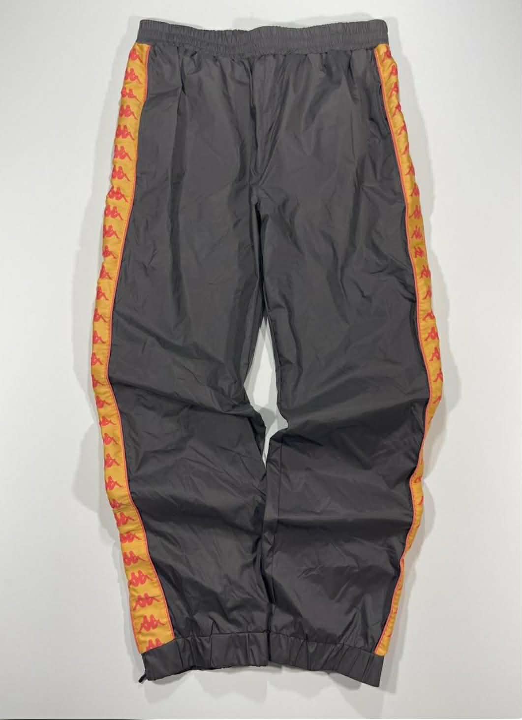 BRANDNEW KAPPA GREY TRACK PANTS WITH ORANGE STRIPES AND LOGO (M)