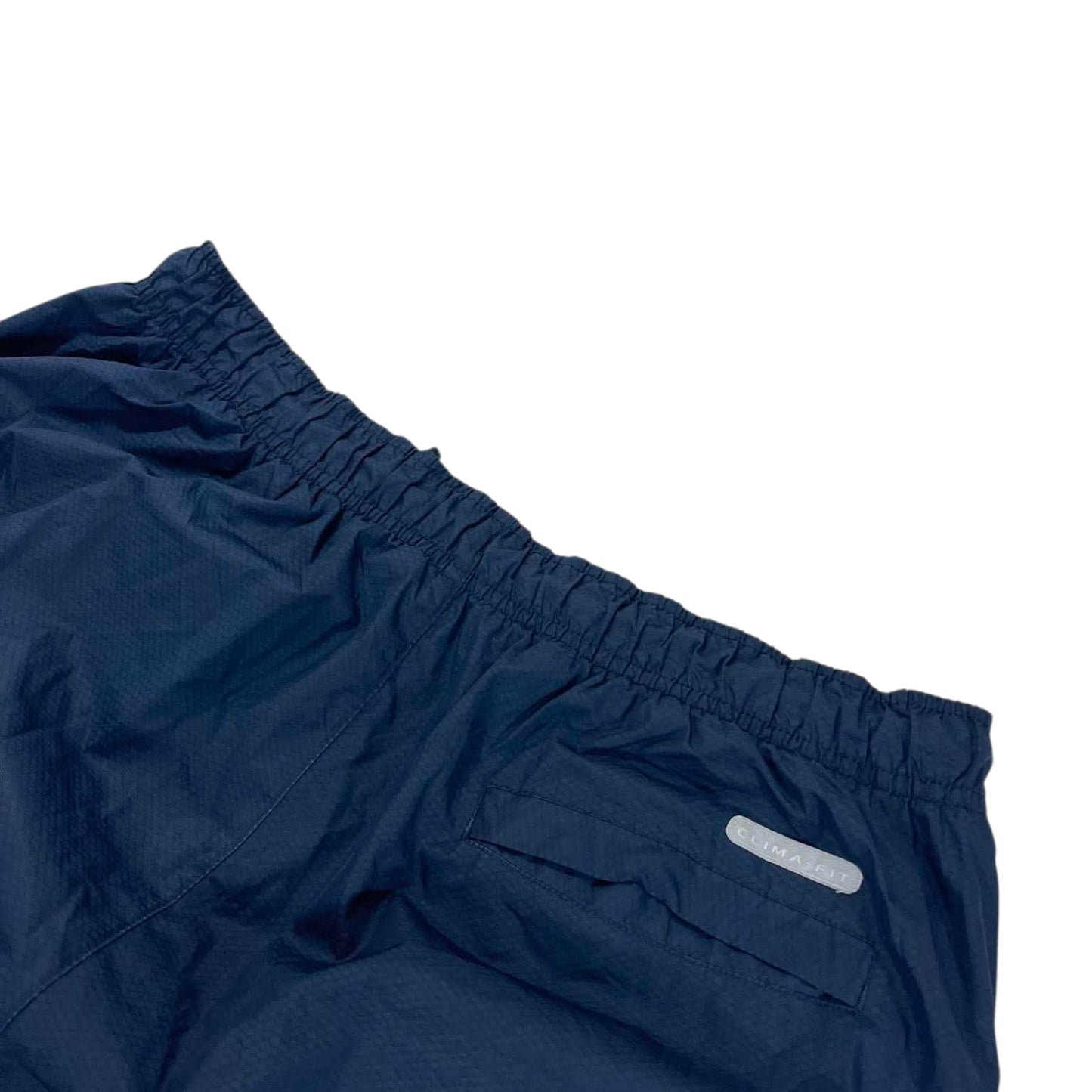 VINTAGE NIKE NAVY BLUE TRACK PANTS (L)