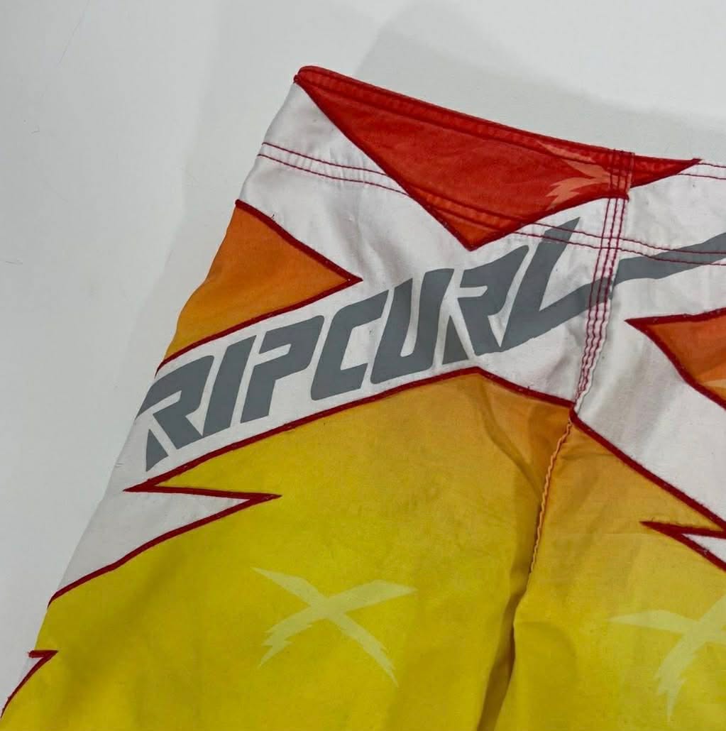 90S RIP CURL YELLOW BOARD SHORTS WITH RED AND WHITE ACCENTS (16)