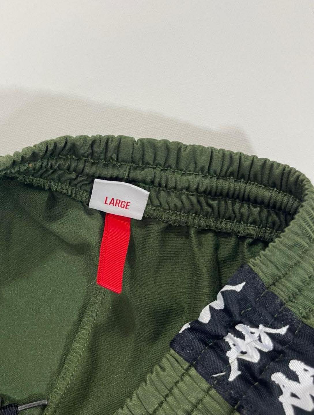 KAPPA GREEN TRACK PANTS WITH WHITE & NAVY STRIPES (M-L)