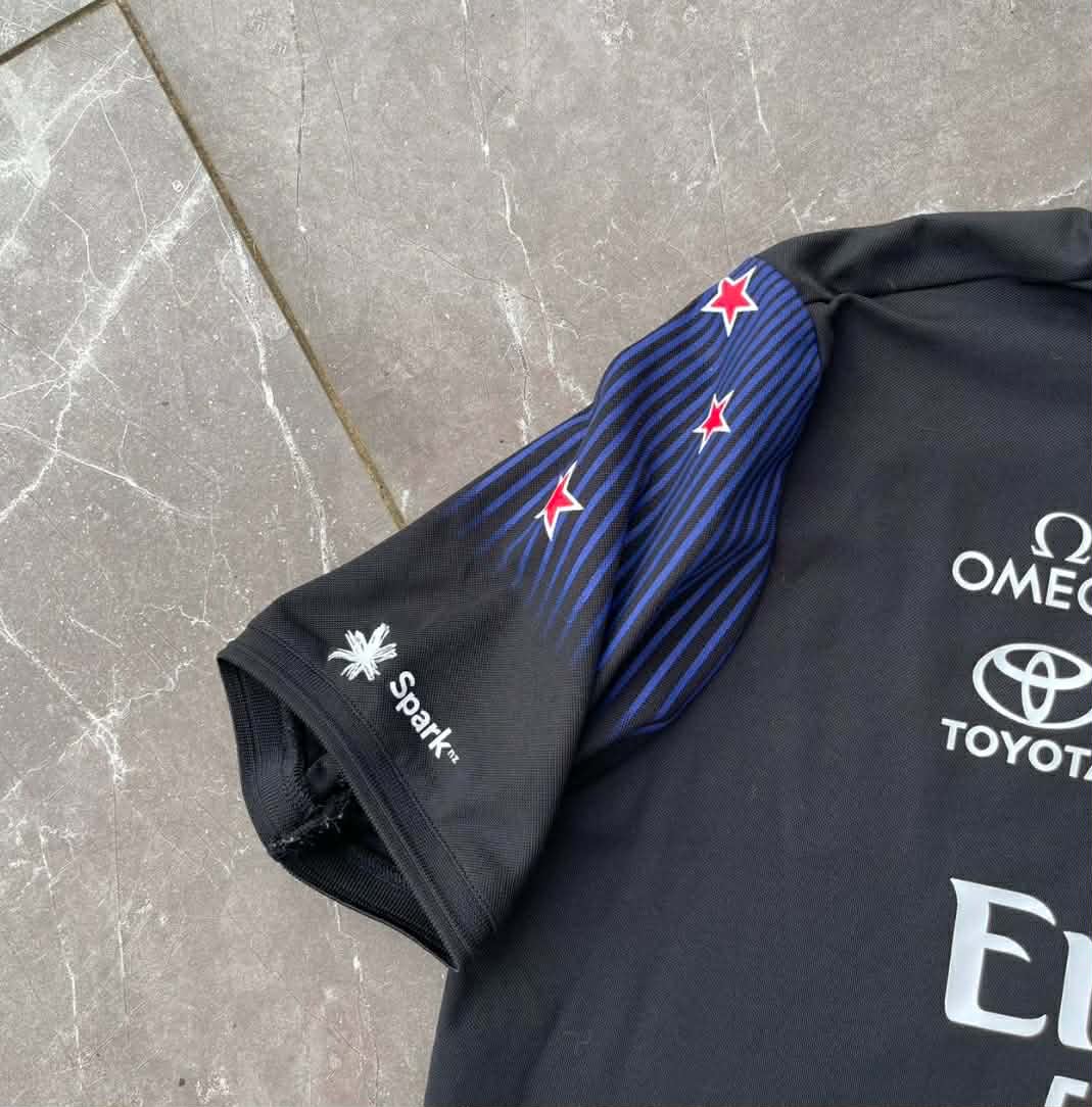 EMIRATES TEAM NEW ZEALAND BLACK POLO SHIRT (M-L)