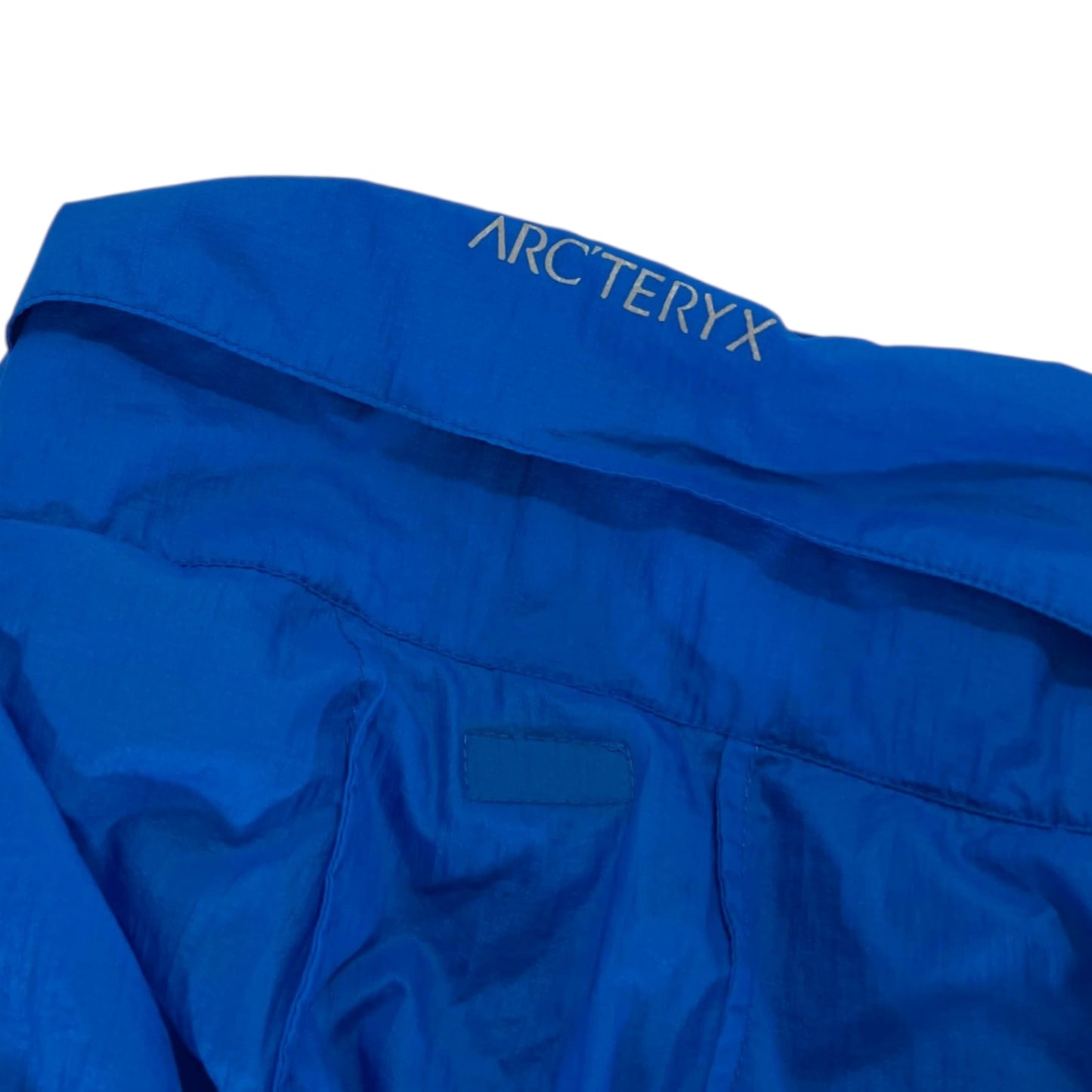 BL ARC'TERYX BLUE NYLON WINDBREAKER (XL)