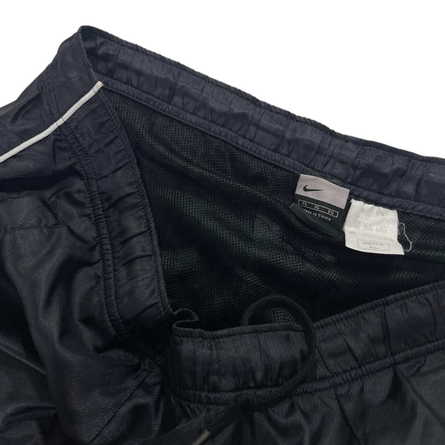 VINTAGE NIKE BLACK/WHITE TRACK PANTS¹⁰ (XL)