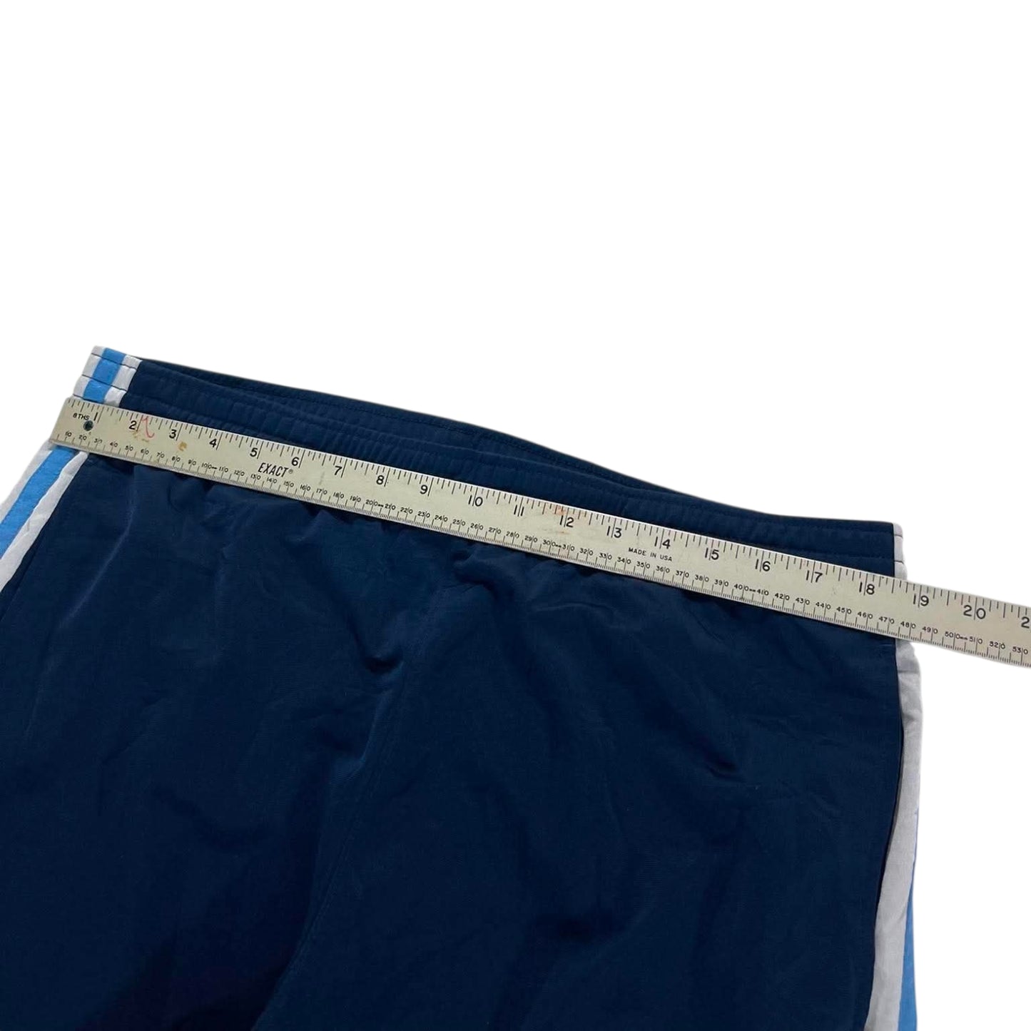 VINTAGE NIKE NAVY BLUE TRACK PANTS  (XL)