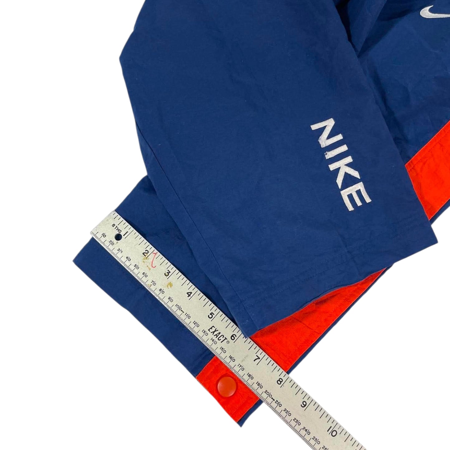 VINTAGE NIKE NAVY BLUE AND ORANGE SNAP ON TRACK PANTS (L)