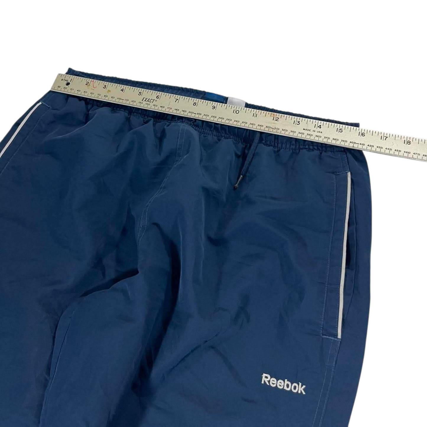 VINTAGE REEBOK NAVY BLUE TRACK PANTS (L) ⁹