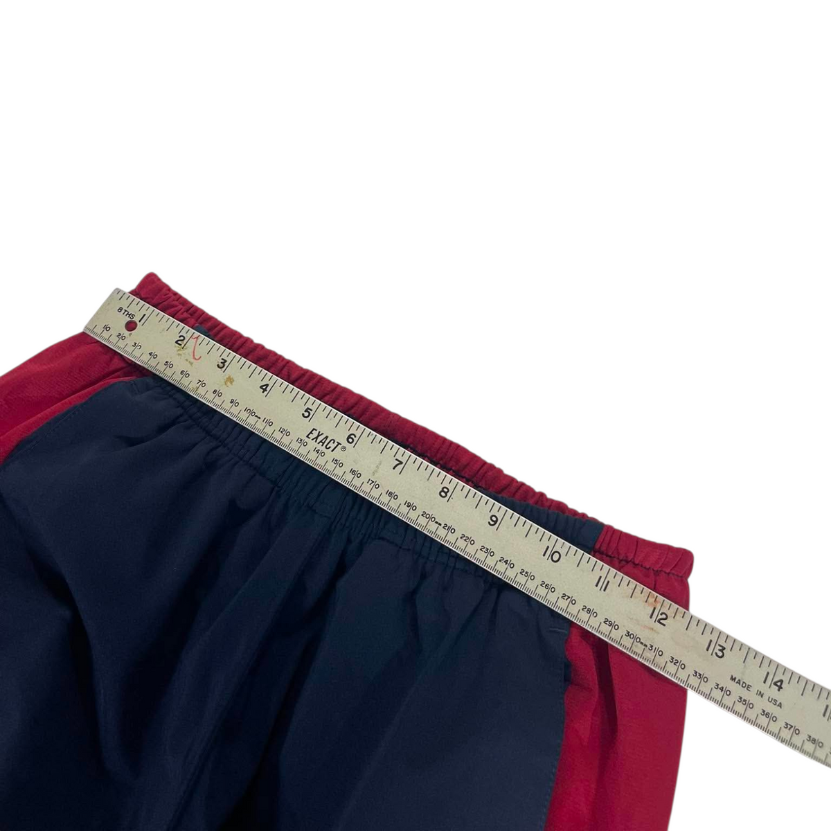 NIKE BLUE/RED TRACK PANTS¹⁰ (S - M)