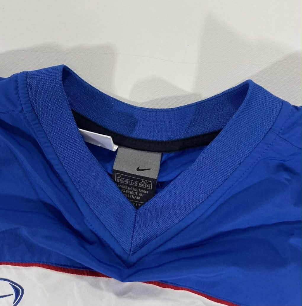 VINTAGE NIKE BLUE & WHITE VINTAGE 90s FOOTBALL SHIRT (L)