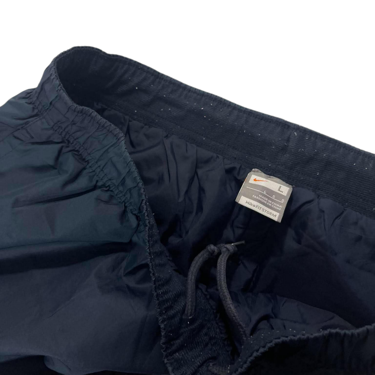 NIKE NAVY TRACK PANTS ⁹ (M - L)