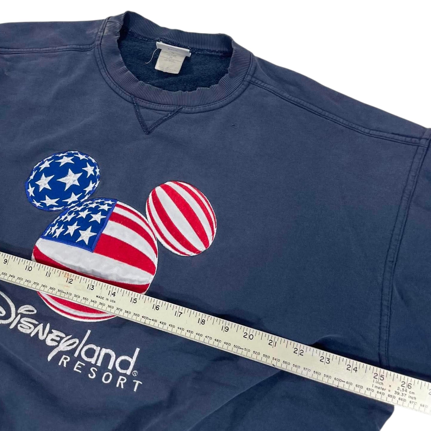 TRASHED DISNEYLAND RESORT SWEATSHIRT WITH AMERICAN FLAG DESIGN (L)