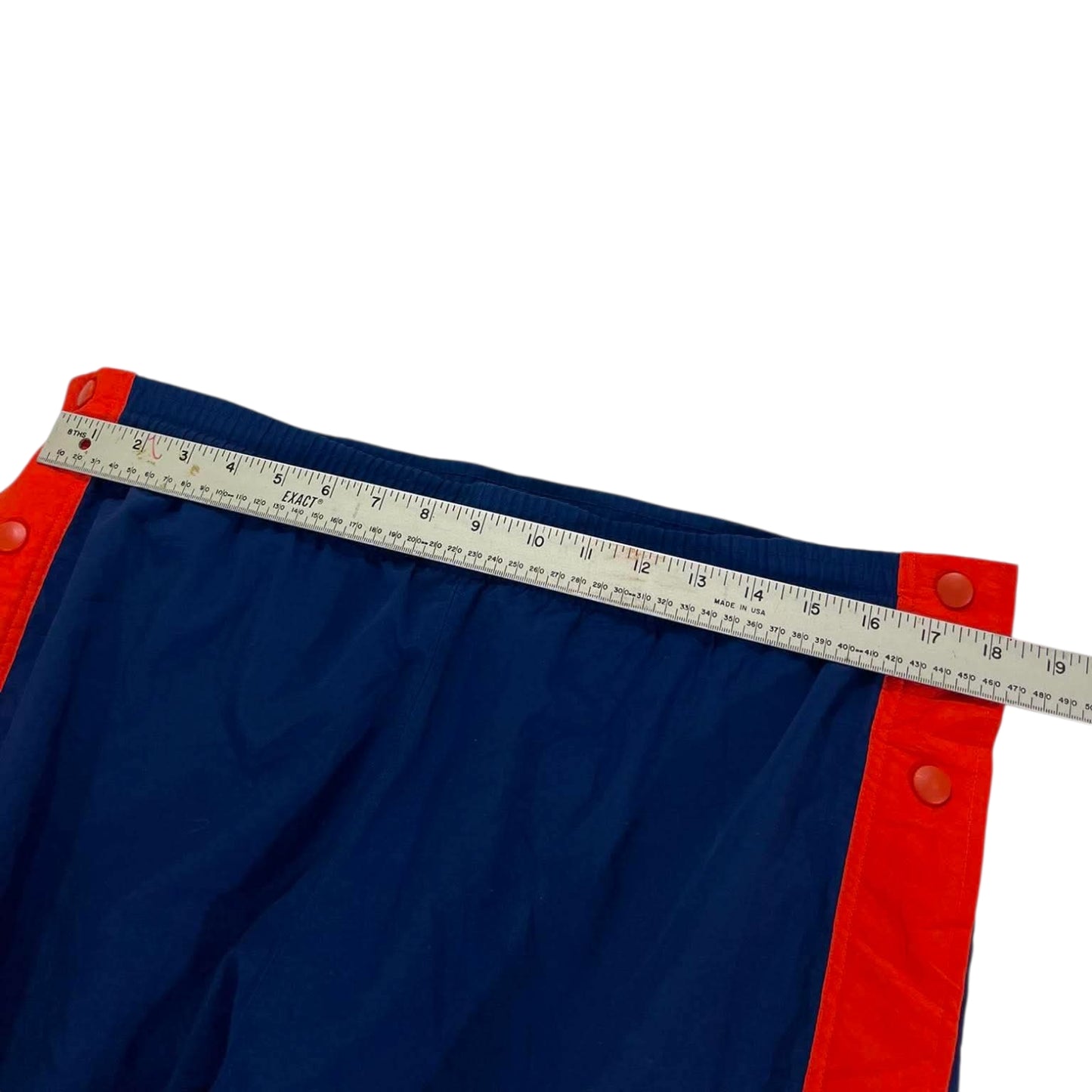 VINTAGE NIKE NAVY BLUE AND ORANGE SNAP ON TRACK PANTS (L)