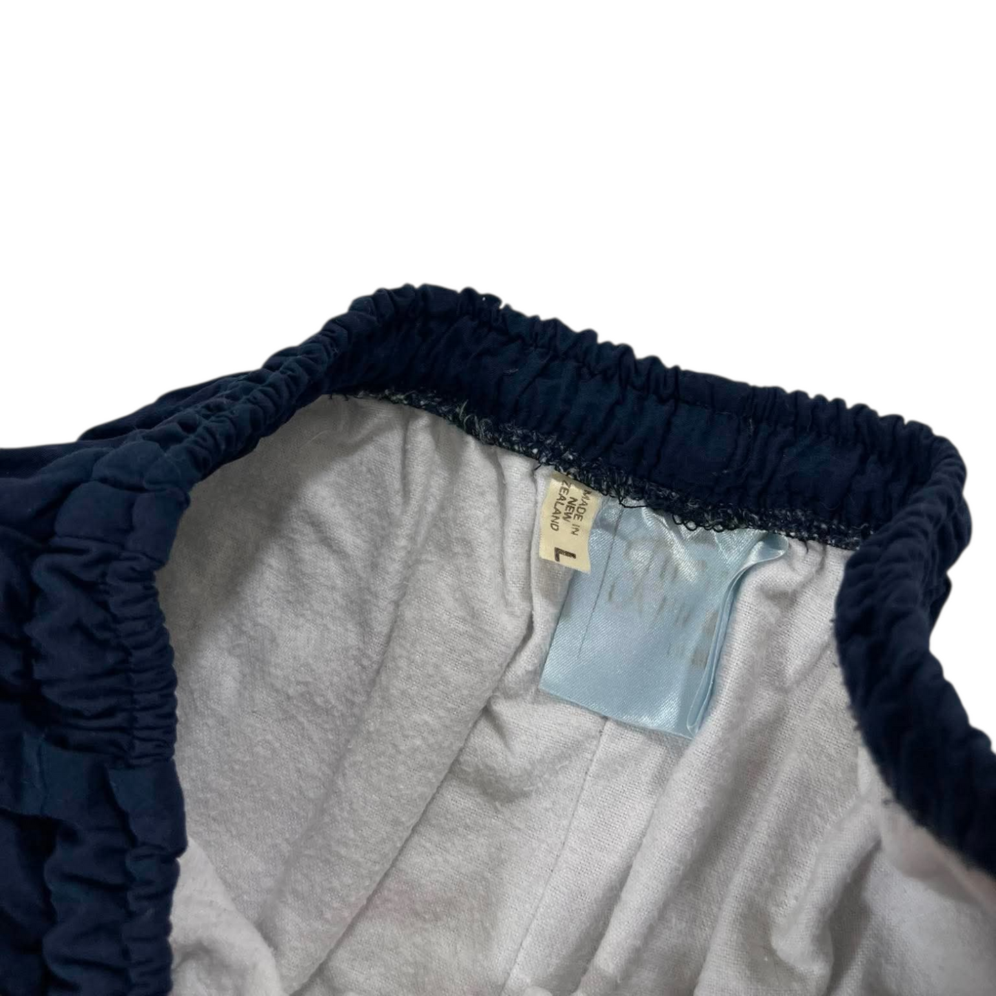 VINTAGE 90S MADE IN NZ TRACK PANTS WITH ELASTIC WAIST AND DRAWSTRING (M)