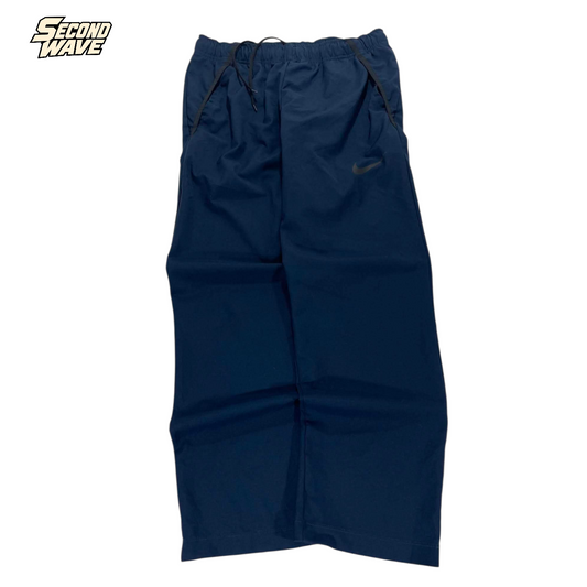 VINTAGE NIKE BAGGY NAVY BLUE SWEATPANTS (M-L)'¹⁹