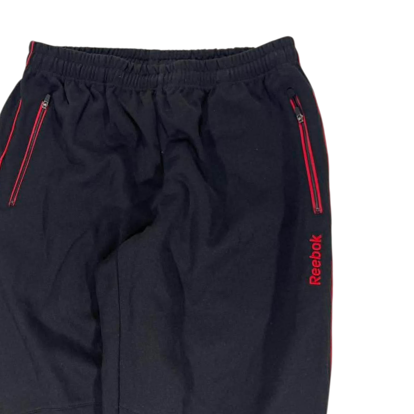 VINTAGE REEBOK BLACK TRACK PANTS WITH RED ACCENTS AND ZIPPER POCKETS (34)