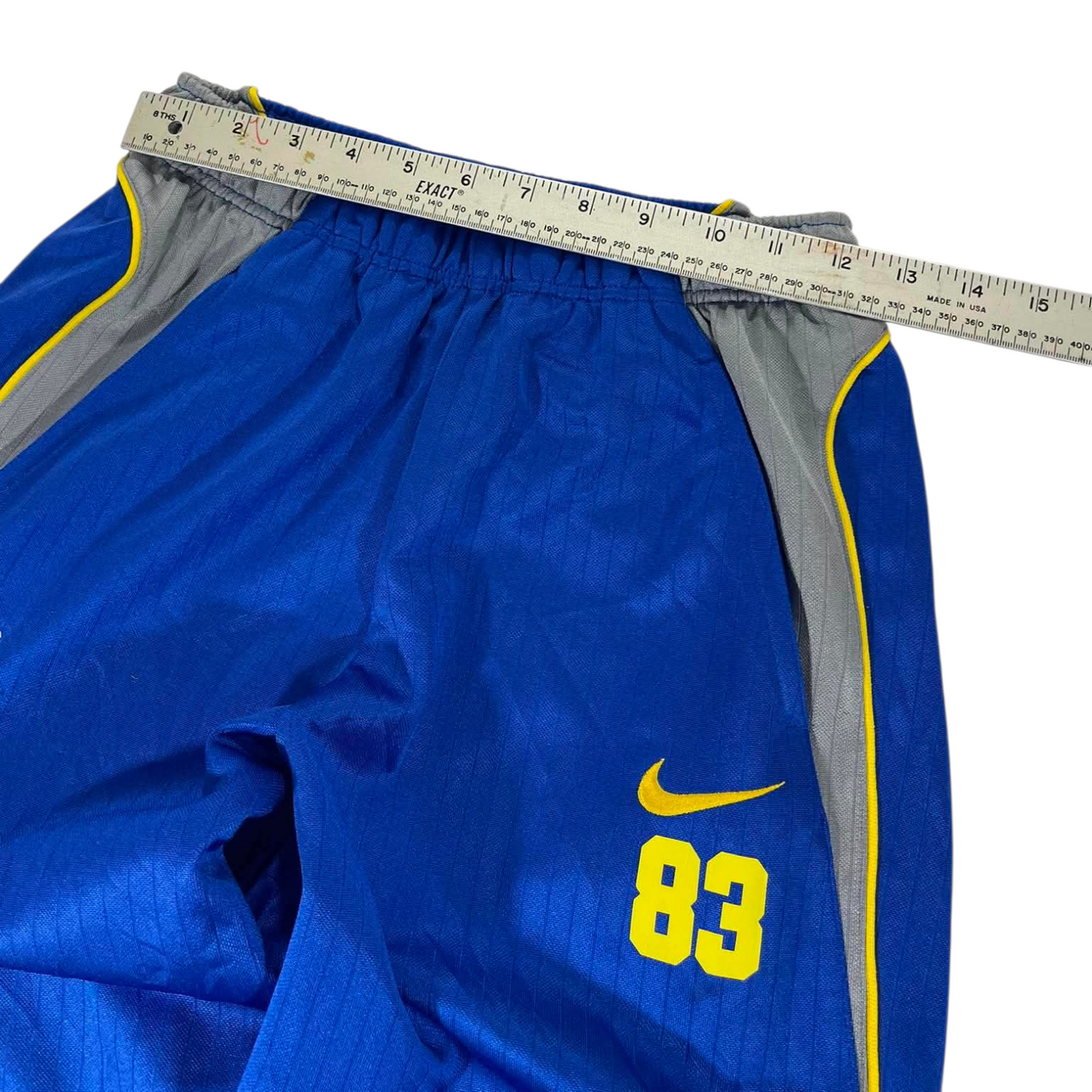 NIKE 90S BLUE TRACK PANTS (M)'¹⁸