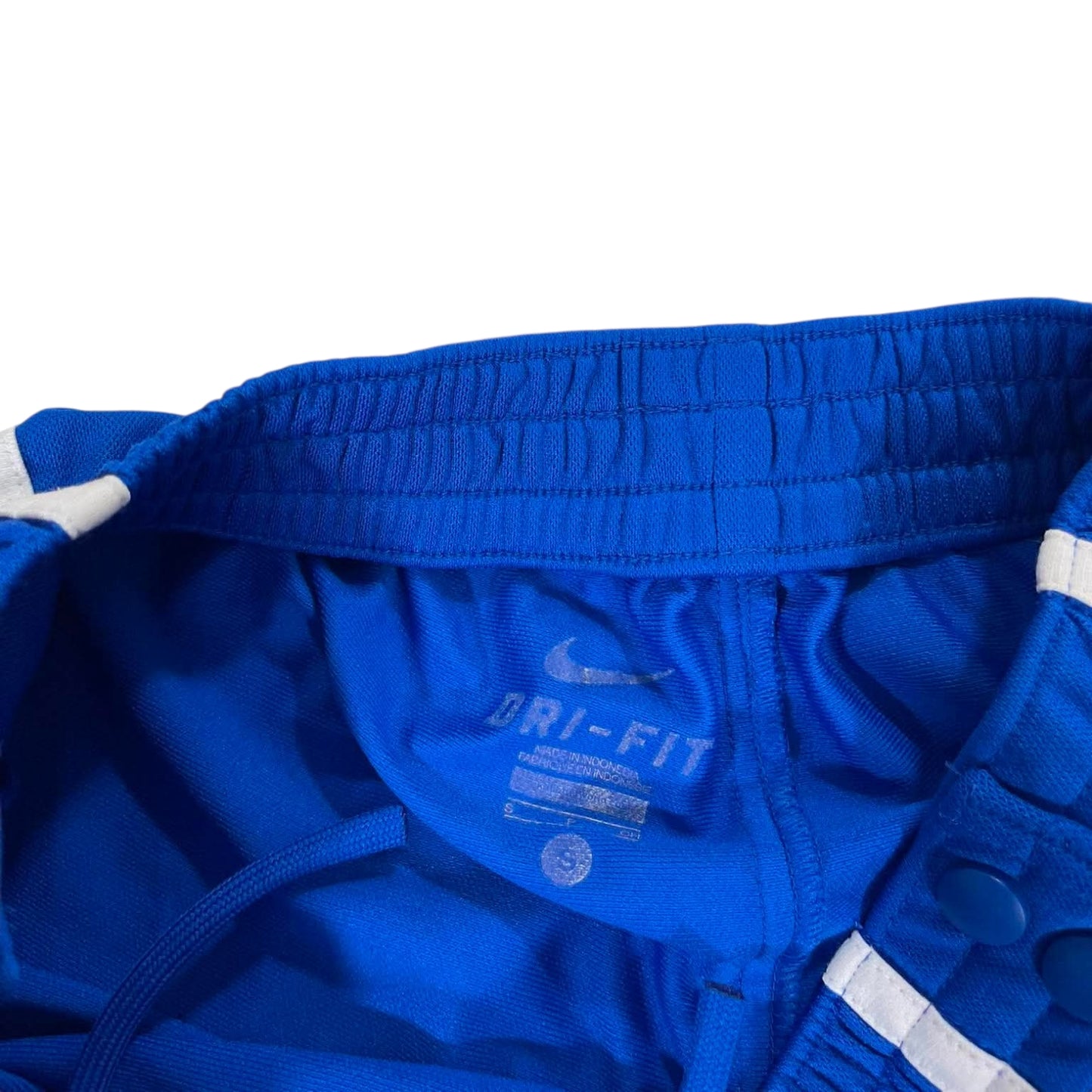 NIKE BLUE SNAP ON TRACK PANTS WITH WHITE STRIPES AND BUTTON FLY (S)