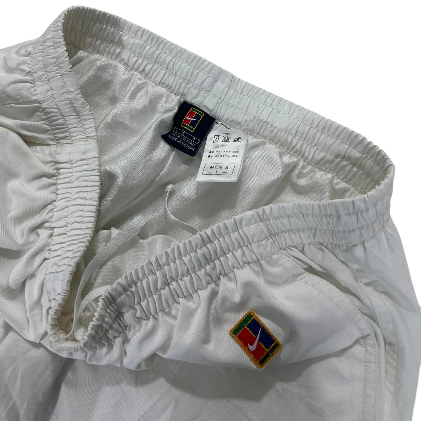 VINTAGE NIKE WHITE TRACK PANTS (L) ¹⁶