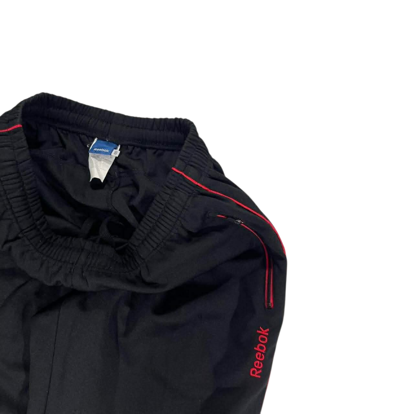 VINTAGE REEBOK BLACK TRACK PANTS WITH RED ACCENTS AND ZIPPER POCKETS (34)