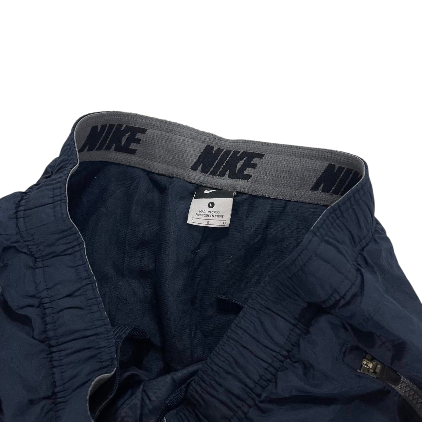 VINTAGE NIKE TRACK PANTS (L)