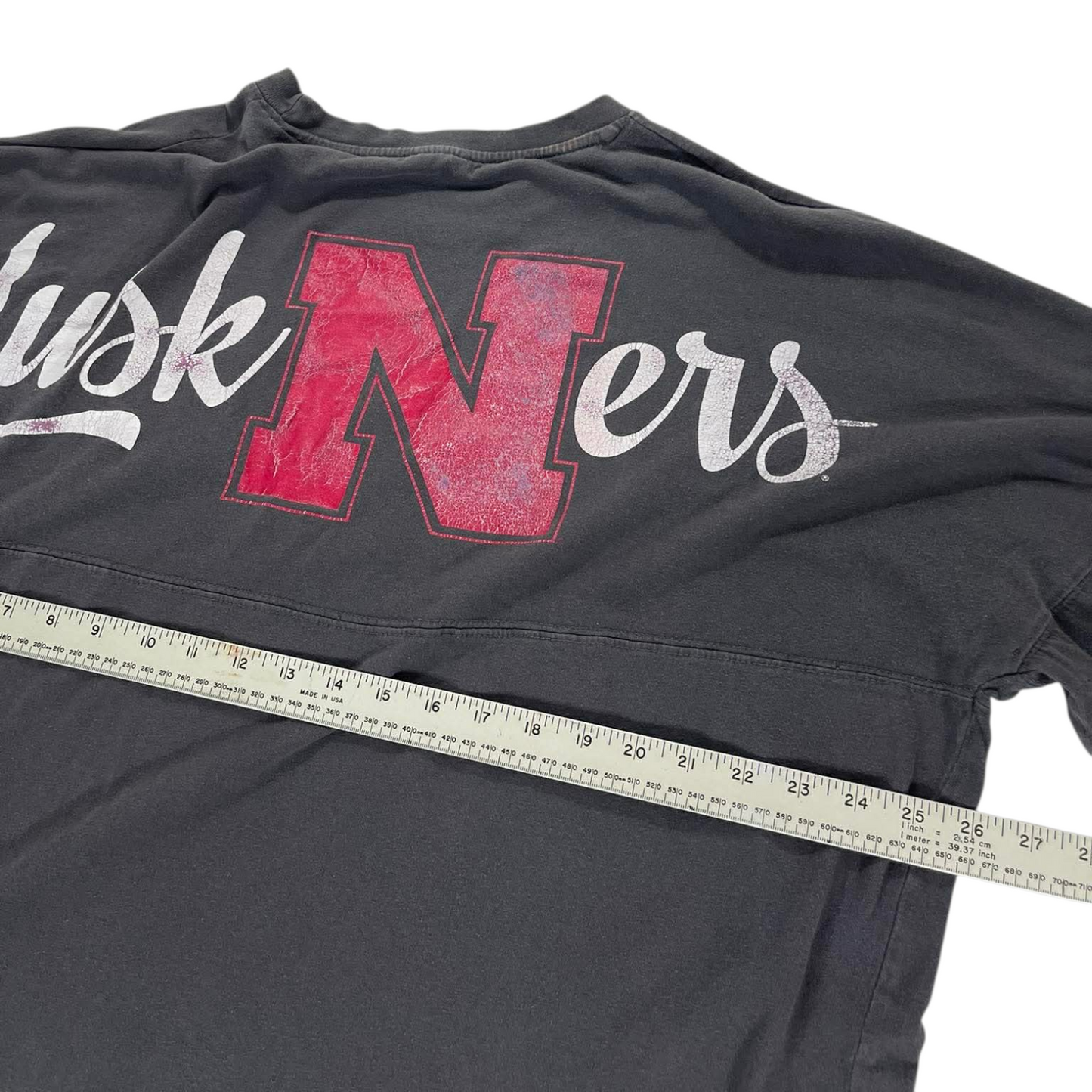 VINTAGE NEBRASKA HUSKERS WITH A BACKHIT LONG SLEEVE SHIRT (XL)