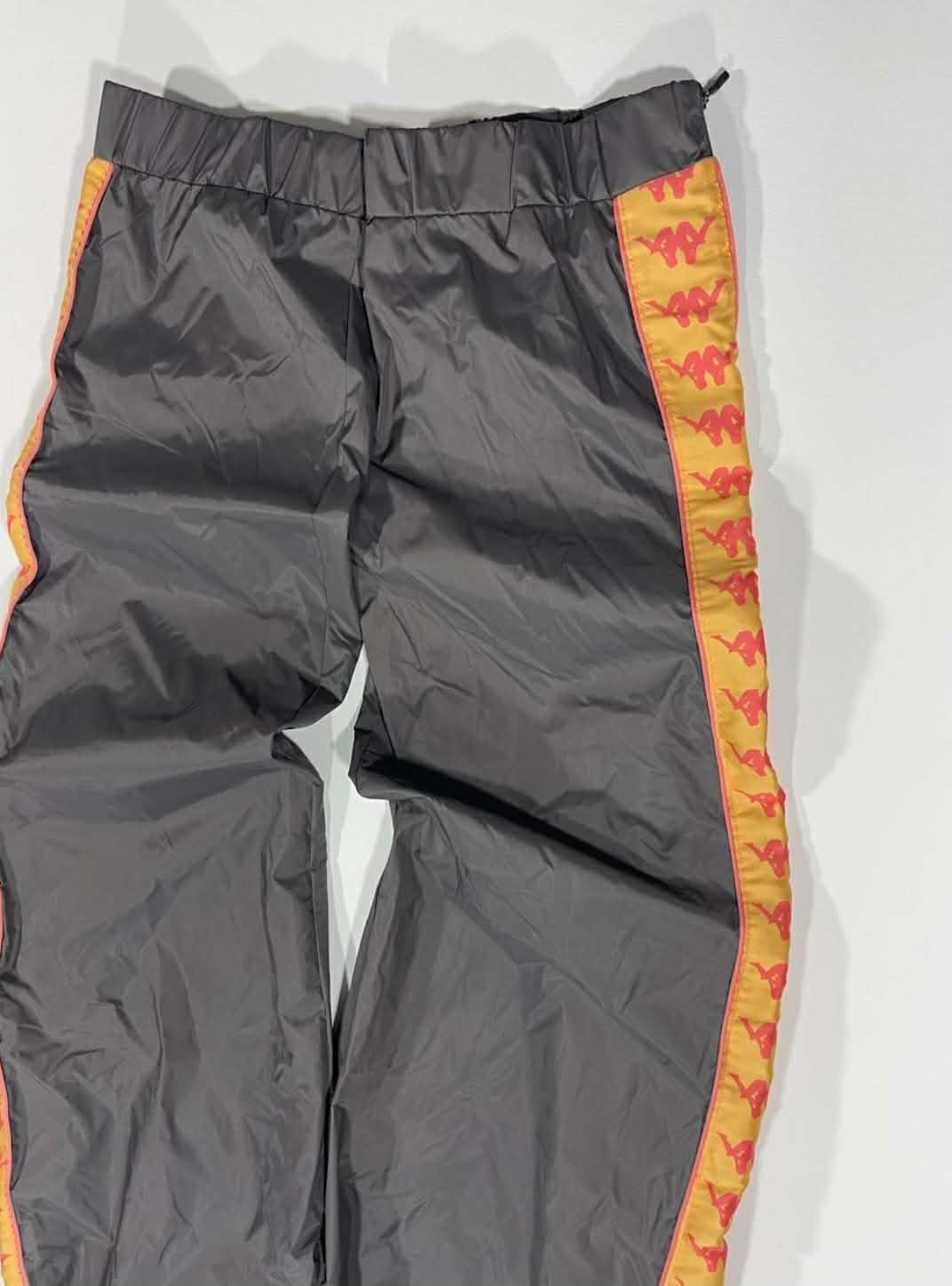 BRANDNEW KAPPA GREY TRACK PANTS WITH ORANGE STRIPES AND LOGO (M)