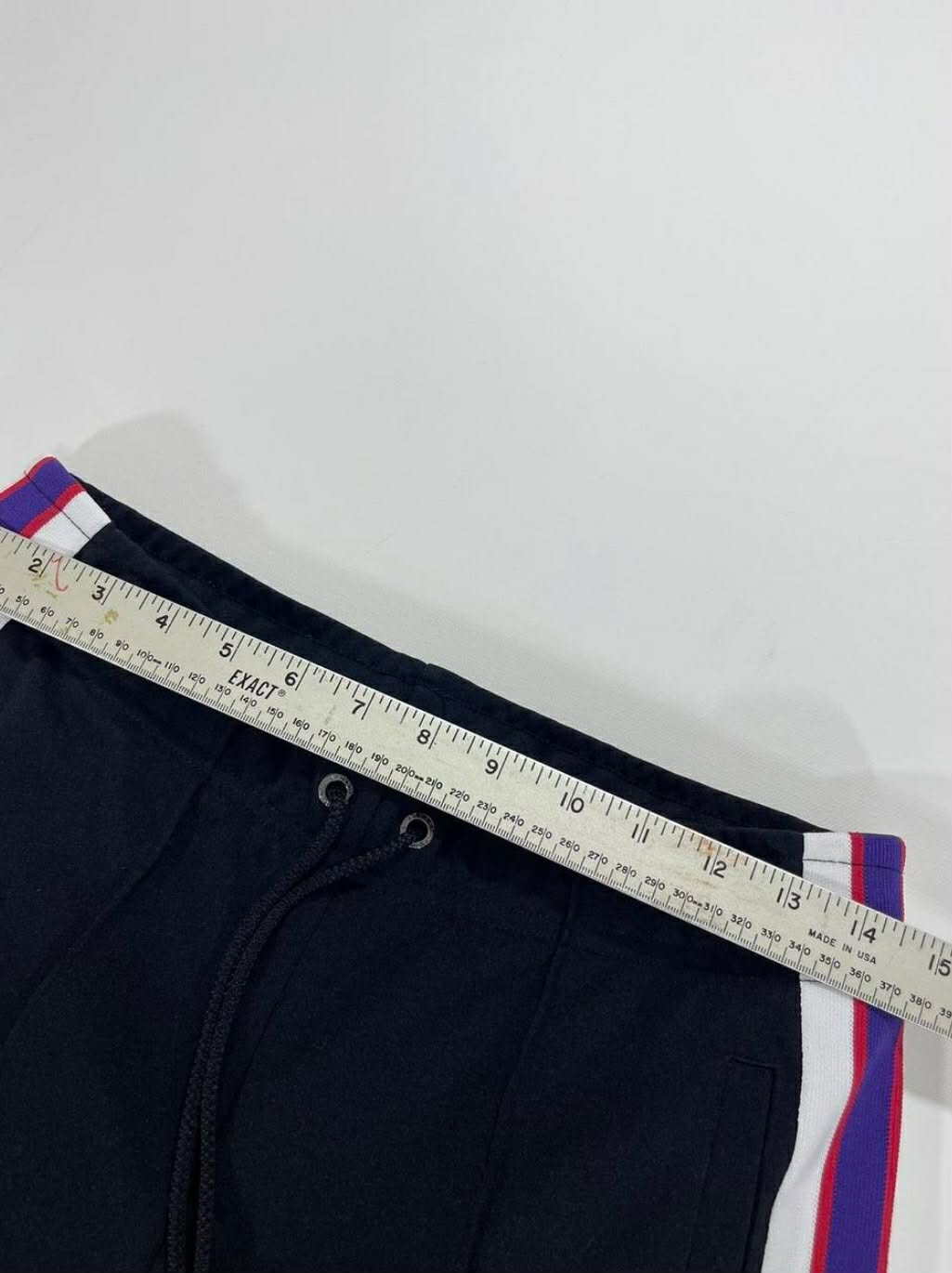 VINTAGE ARAMANI EXHANGE NAVY TRACK PANTS WITH RED AMD WHITE STRIPES(M/30)