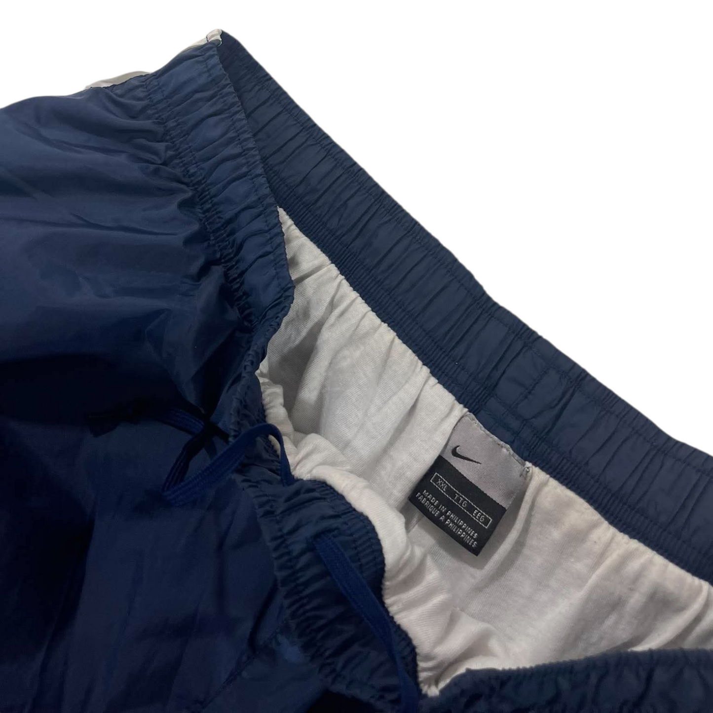 VINTAGE NIKE NAVY BAGGY TRACK PANTS⁶ (BEST FIT LARGE - XL)