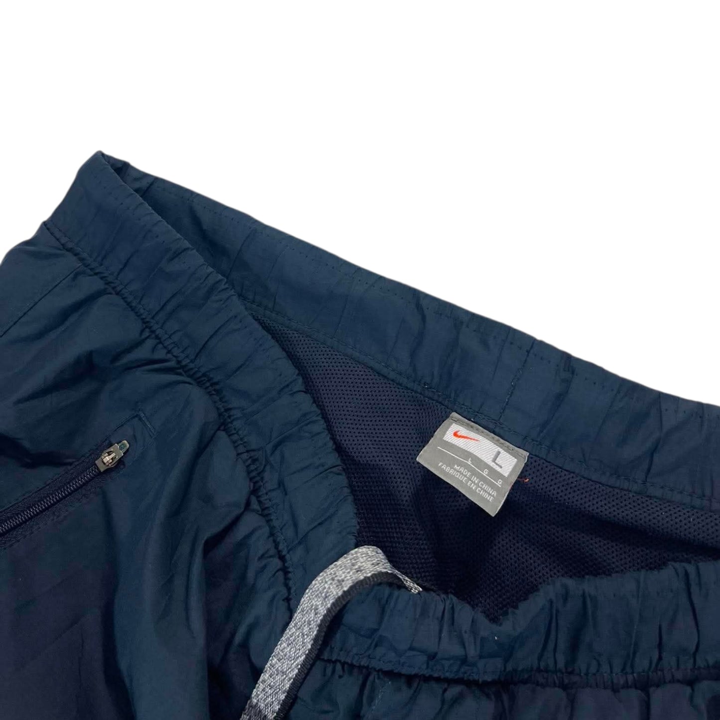 VINTAGE NIKE NAVY BLUE TRACK PANTS (L)
